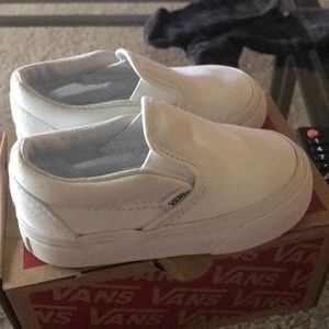 white slip on Vans